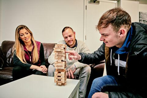 Support services - Ludlow foyer - playing jenga