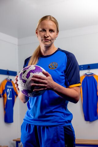 Vikki holding a ball