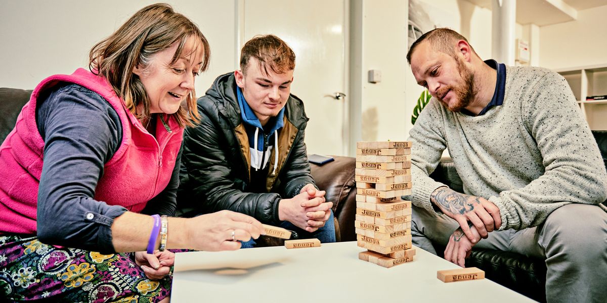 Support worker with residents at the Ludlow Foyer and Grain Loft supported accomodation