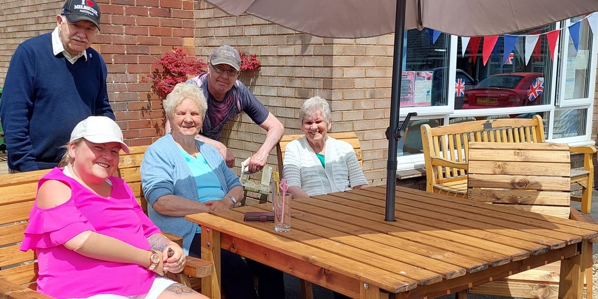 Residents at Independent Living Scheme at St Mary's Place, Cleobury Mortimer, Shropshire enjoy outdoor furniture