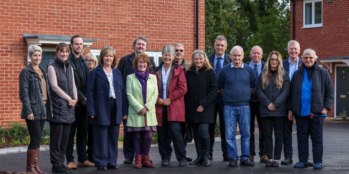 Representatives from Connexus, J Harper & Sons Ltd, councillors and members of the local community at the opening of the new homes. 