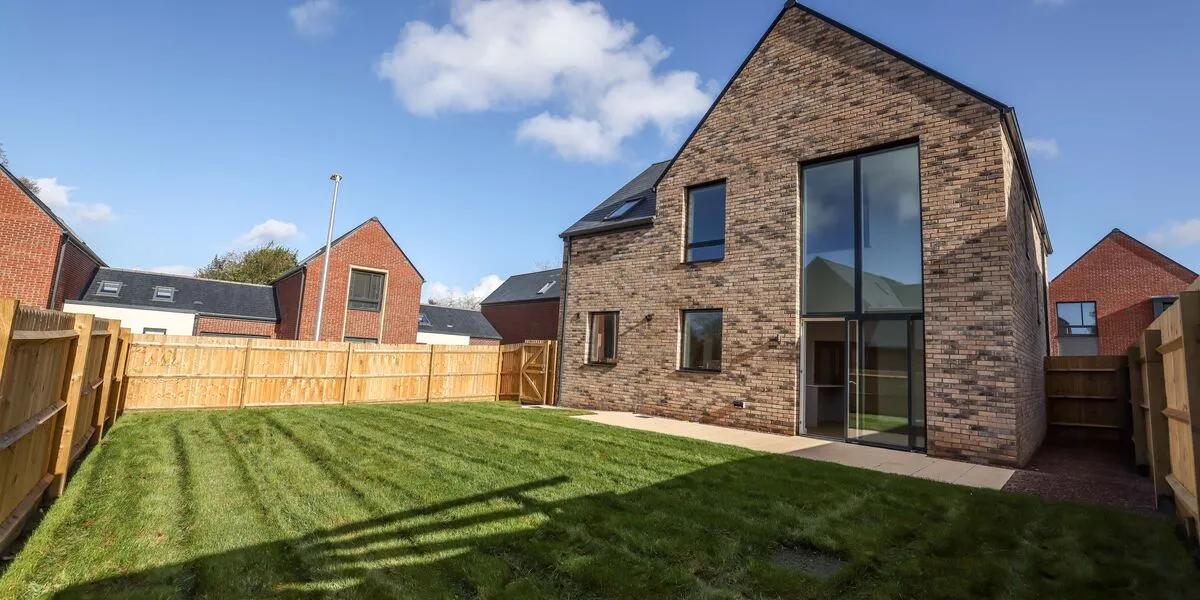 This new home has a nice lawn!