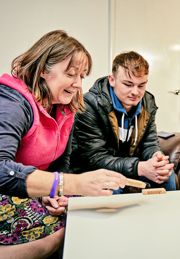 Support worker with residents at the Ludlow Foyer and Grain Loft supported accomodation