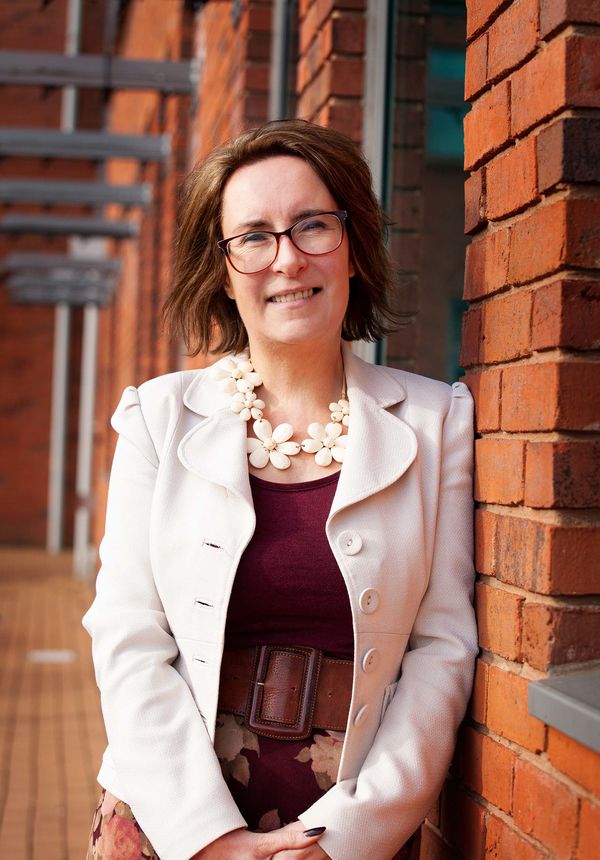 Sara Woodall pictured next to the Connexus head office at Craven Arms