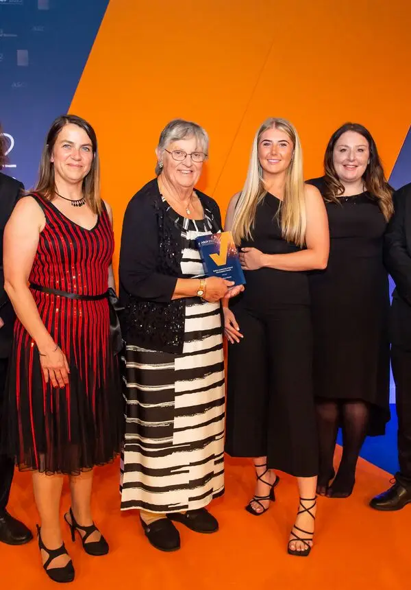 The team from Connexus receiving the award on stage at ASCP Awards. 