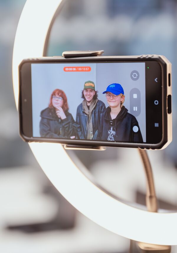 Podcasting using a mobile phone and ring light