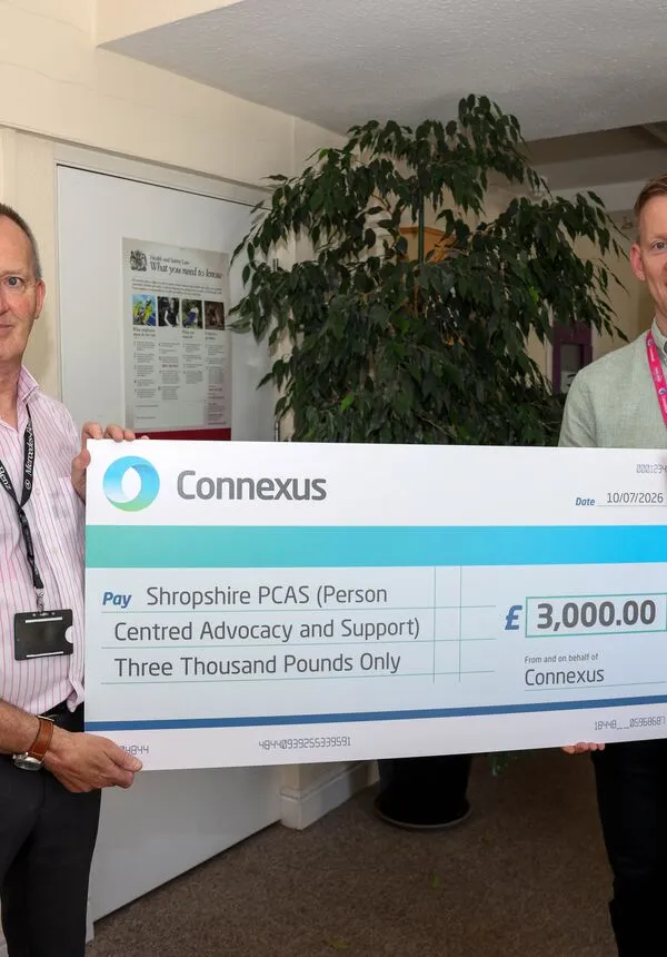 Simon Arthur and Nick Batt with giant cheque