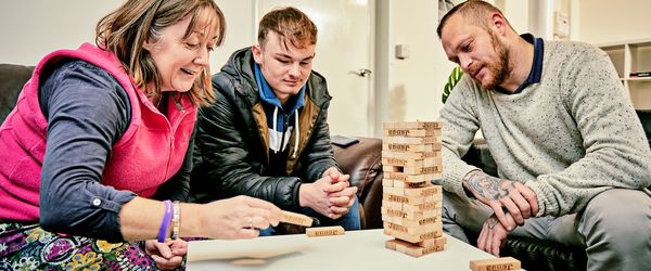 Support worker with residents at the Ludlow Foyer and Grain Loft supported accomodation