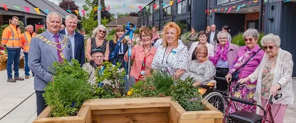 The Mayor of Wem, Councillor Peter Broomhall, officially opens the revamped community garden at our Westlands Independent Living Centre. 