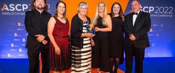 The team from Connexus receiving the award on stage at ASCP Awards. 