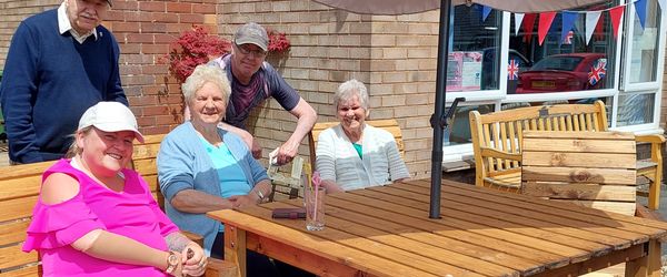 Residents at Independent Living Scheme at St Mary's Place, Cleobury Mortimer, Shropshire enjoy outdoor furniture