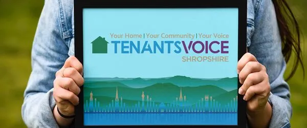 Woman holding up a tablet device with the words 'Tenants Voice' on the screen