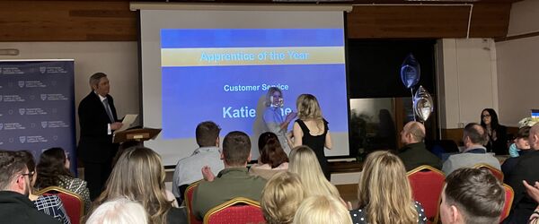 Katie accepting award