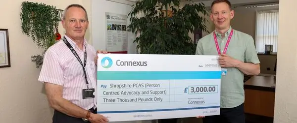 Simon Arthur and Nick Batt with giant cheque