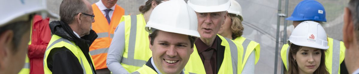 Housing secretary on building site