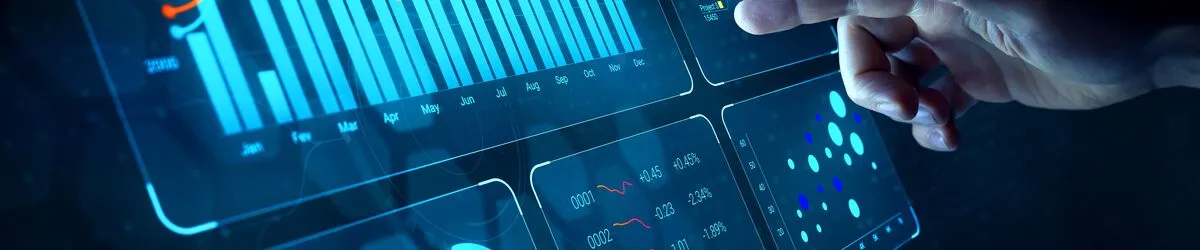 picture shows finger pointing at graph on computer screen