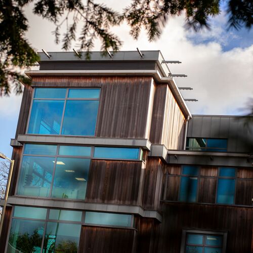 The Connexus head office shown through some trees