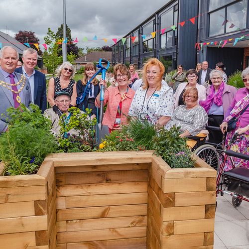 The Mayor of Wem, Councillor Peter Broomhall, officially opens the revamped community garden at our Westlands Independent Living Centre.