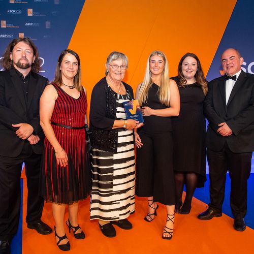 The team from Connexus receiving the award on stage at ASCP Awards.