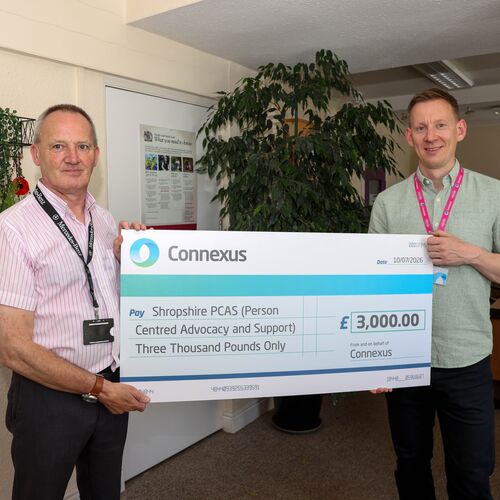 Simon Arthur and Nick Batt with giant cheque