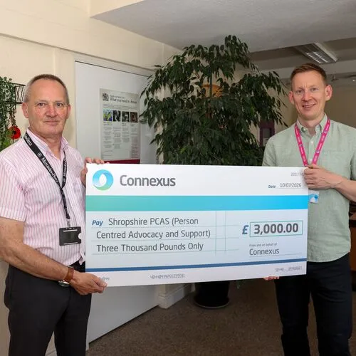 Simon Arthur and Nick Batt with giant cheque